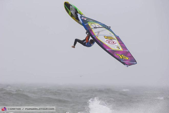 Ricardo Campello one-footed backloop - PWA Cold Hawaii World Cup 2013 ©  John Carter / PWA http://www.pwaworldtour.com